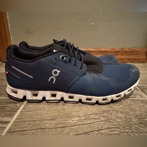 On Running Blue and White Athletic Shoes with Cloud Cushioning